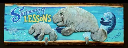 Manatees Swimming sign